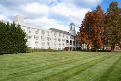 Distant view of the hotel & lawn at The Madison Hotel