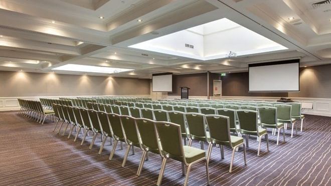 A largescale pillarlerss conference room offering natural light