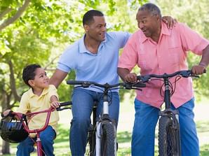 Grandfather, grandson & son on bike riding at Legacy Vacation