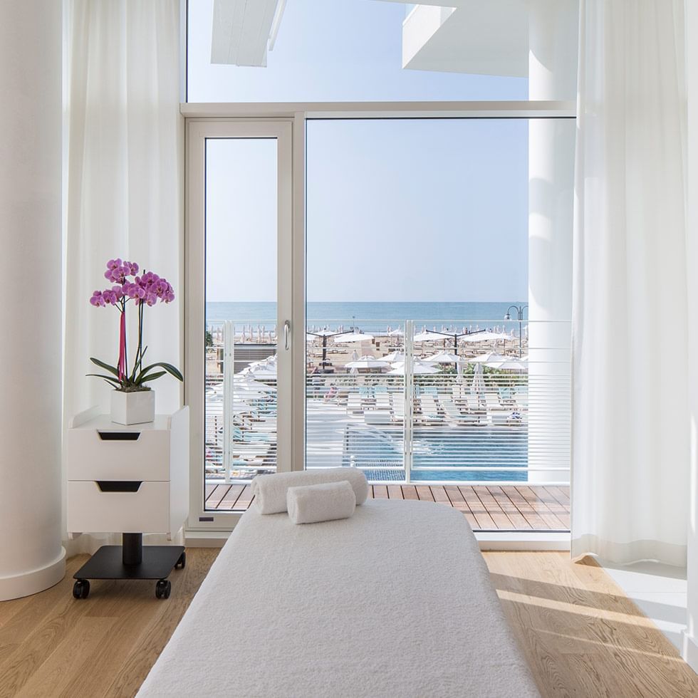 A spa bed with sea view balcony at Falkensteiner Hotels