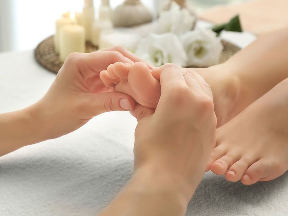 Gentle foot massages given in the spa of Hotel Sumaq