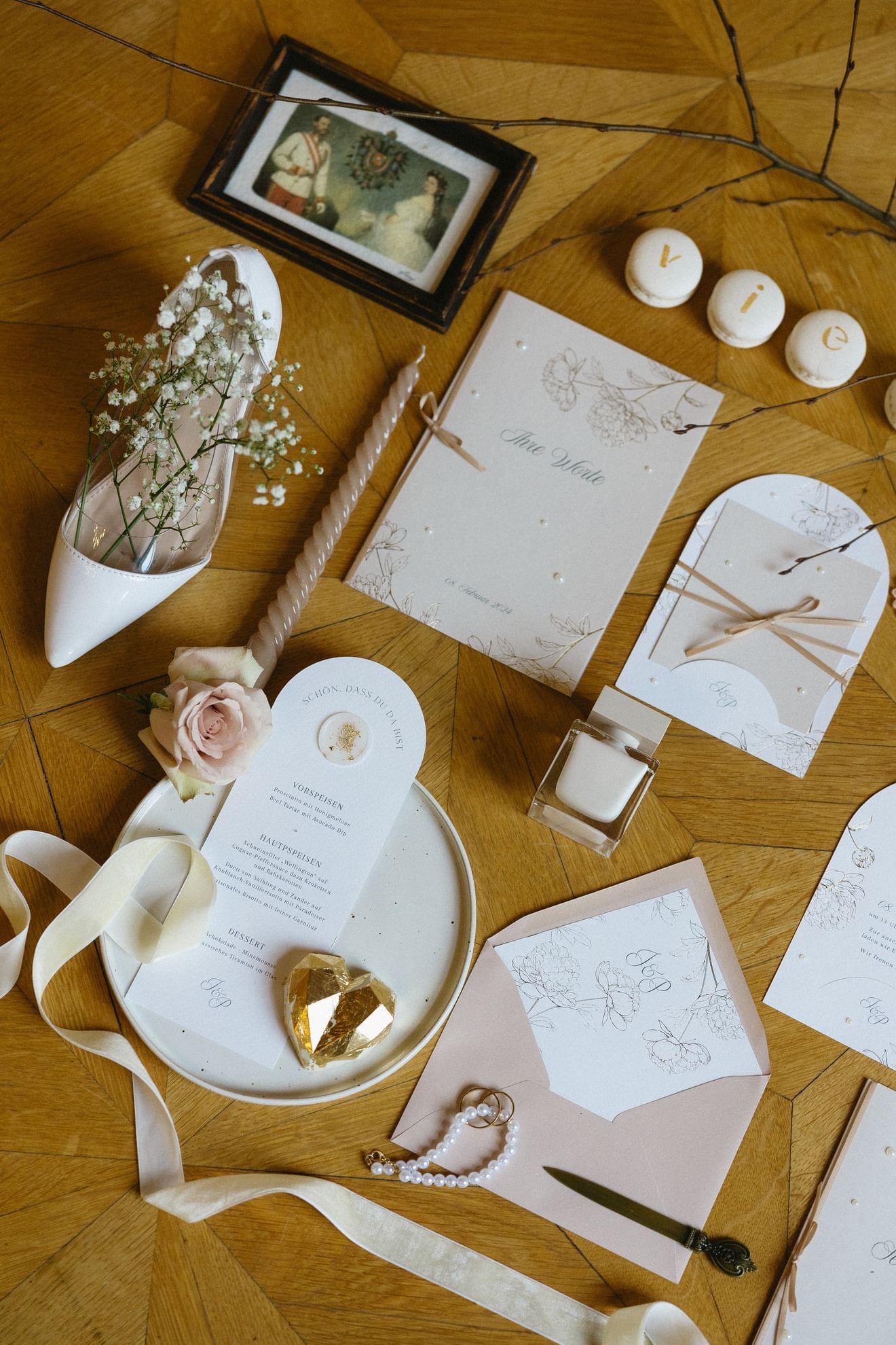 Wedding stationery displayed on rustic wooden table at Almanac Palais Vienna