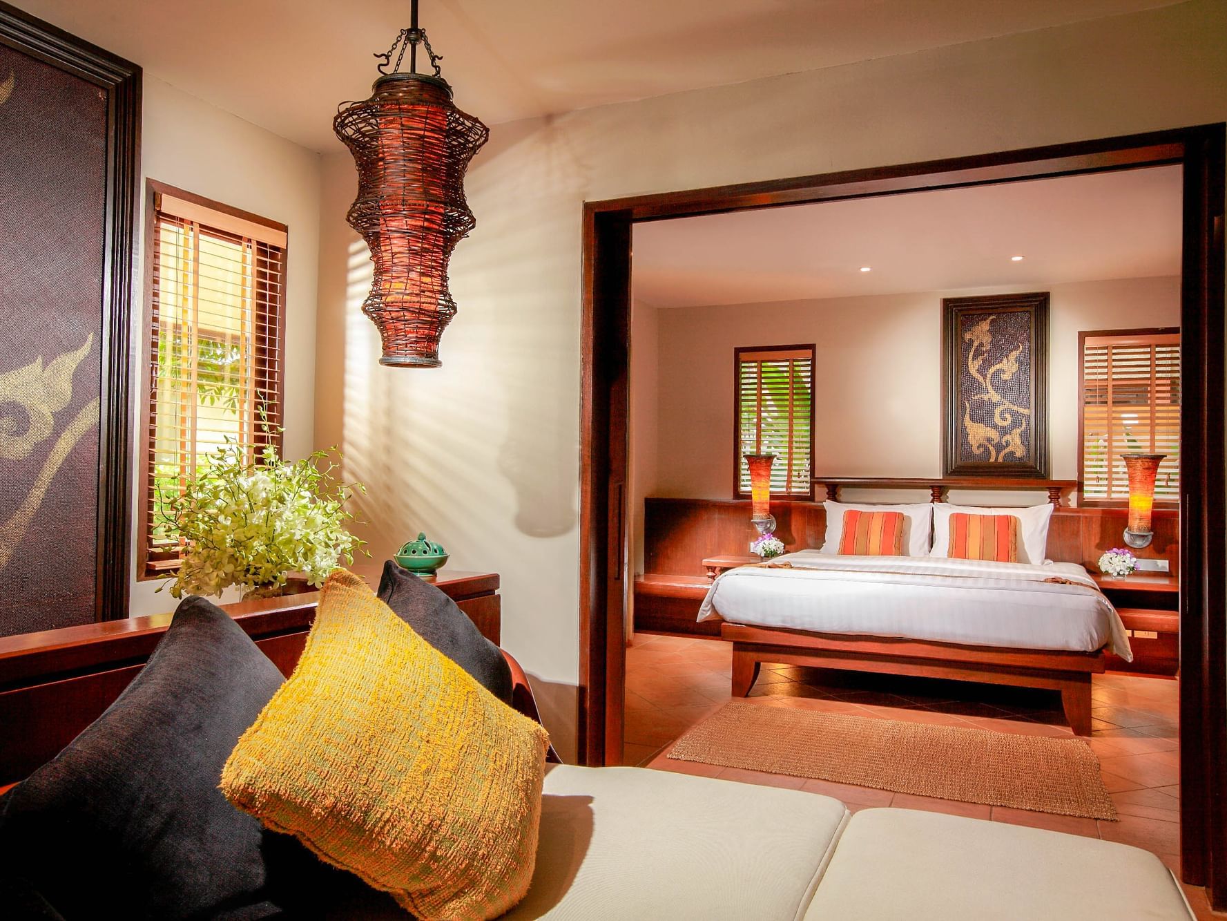 One-bedroom suite villa with King bed in bedroom and sofa bed in the living room