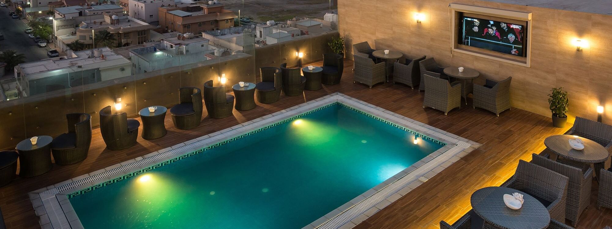 Rooftop Pool with city overview at The Naviti by Warwick Dammam