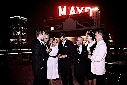 Group of friends on the terrace at The Mayo Hotel
