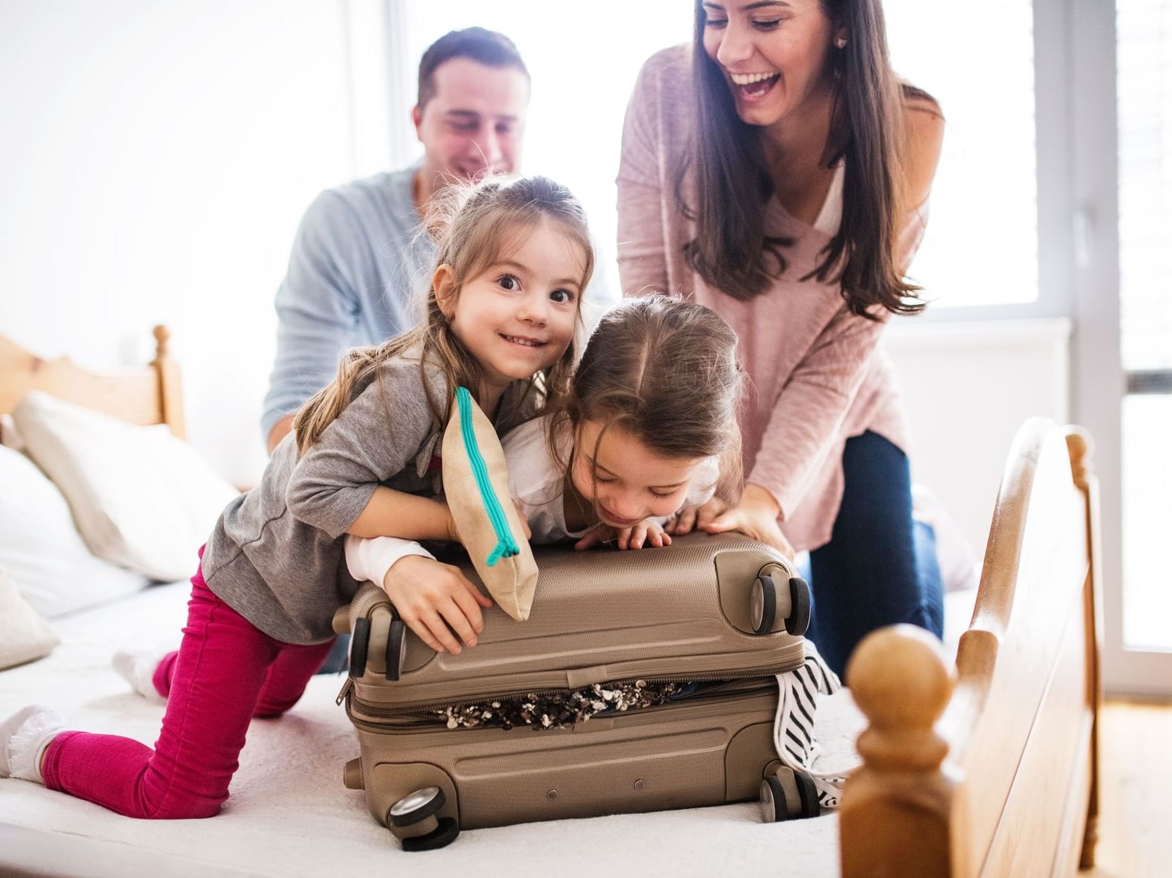 Family having fun together - Monte Carlo Inn and Suites Downtown Markham