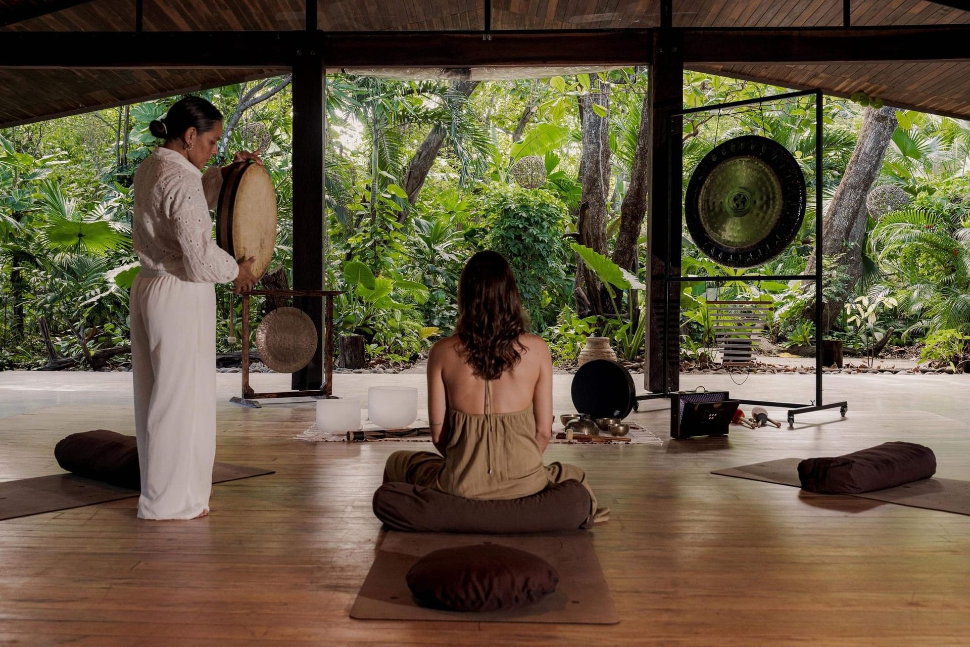 Spiritual sound healing with gongs and drums in Lahari Wellness Center at Cala Luna Boutique Hotel