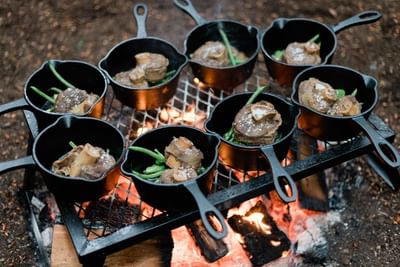 Dishes being cooked at secret supper at Alderbrook Resort & Spa