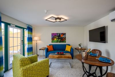 Living room with modern interior & decor in Honeymoon Suite at Amsterdam Manor Beach Resort