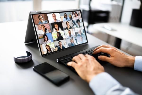 Man having virtual meeting one of the benefits of hybrid working