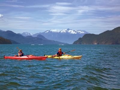Two kayakers on Harrison Lake at Harrison Hot Springs Resort