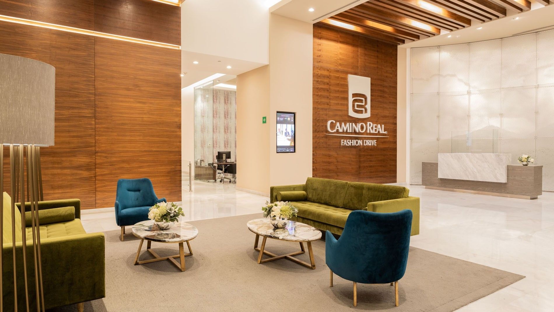 Elegant hotel lobby at Camino Real Fashion Drive with modern velvet seating at Camino Real Fashion Drive, Monterrey