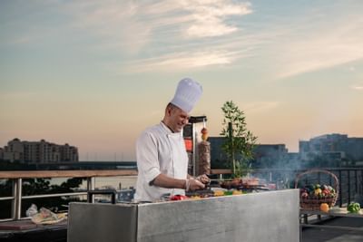 Chef cooking in the Veranda at Bay La Sun Hotel & Marina