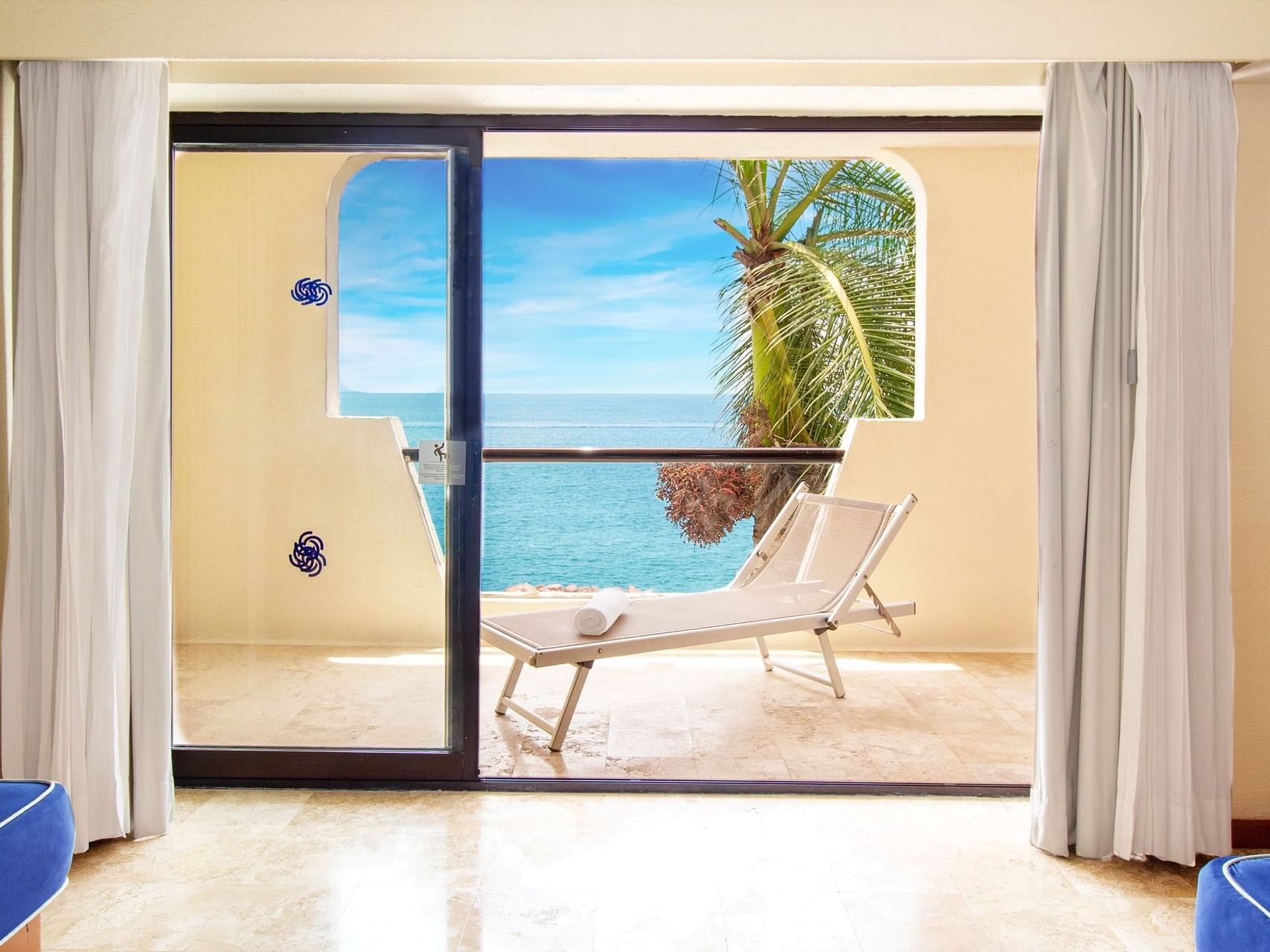 Lounger by balcony of 1 Bedroom Suite Ocean View at Plaza Pelicanos Grand Beach Resort