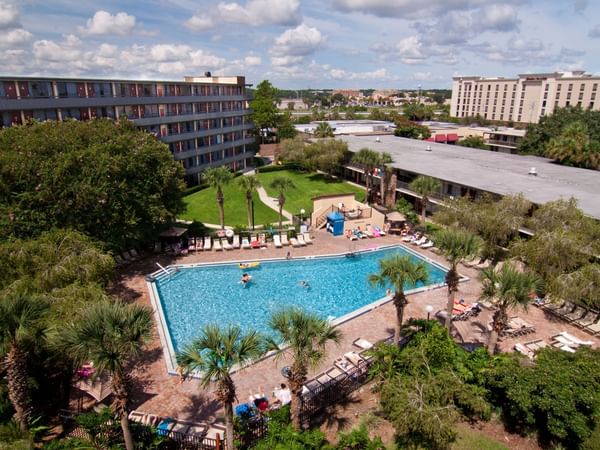 An aerial view of the pool & hotel at Rosen Inn International