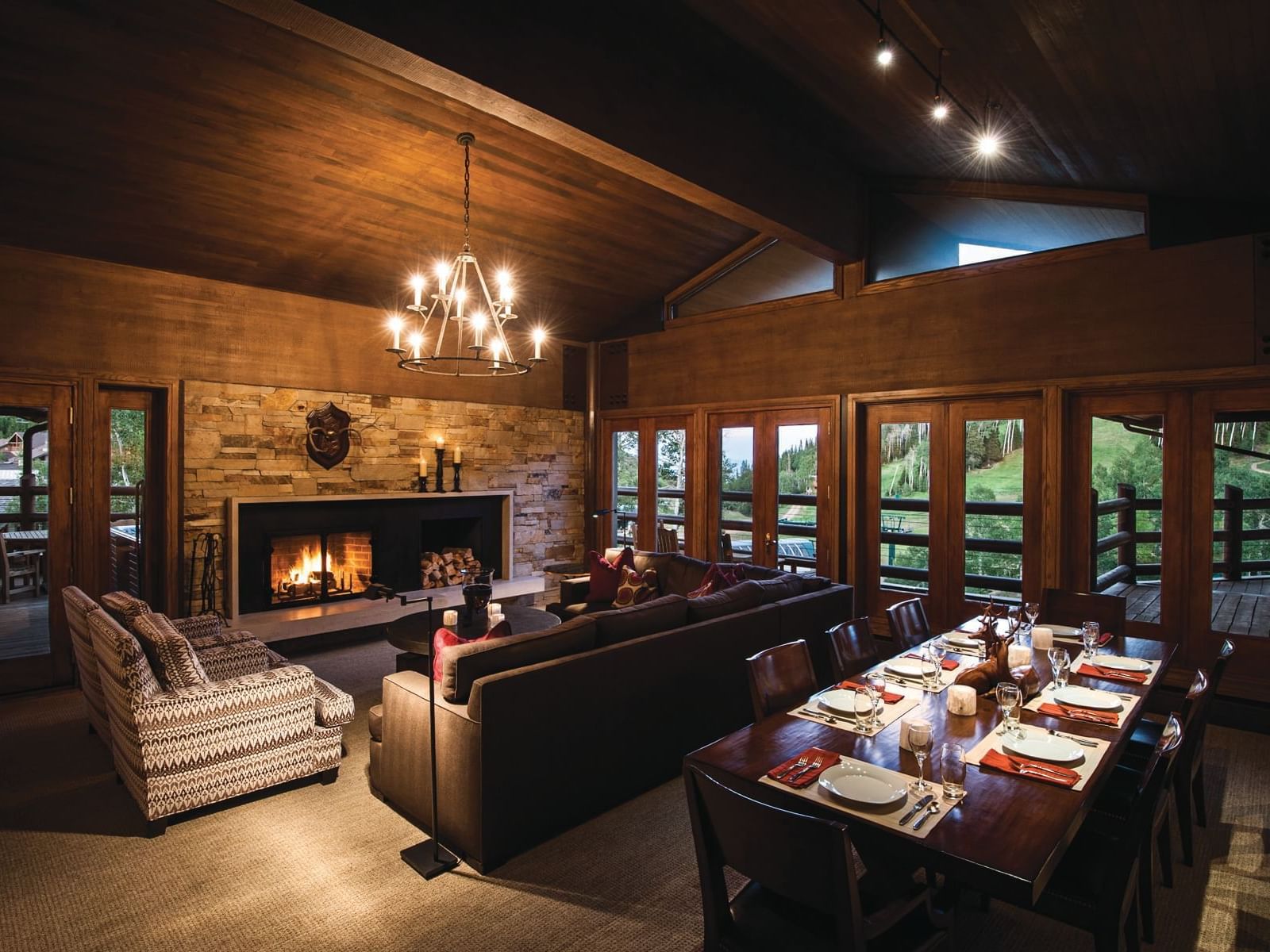 Living area with couches & a dining table at Stein Grand Suite