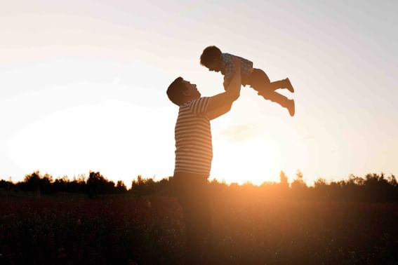 Father and son playing in the sunset at The Danna Langkawi