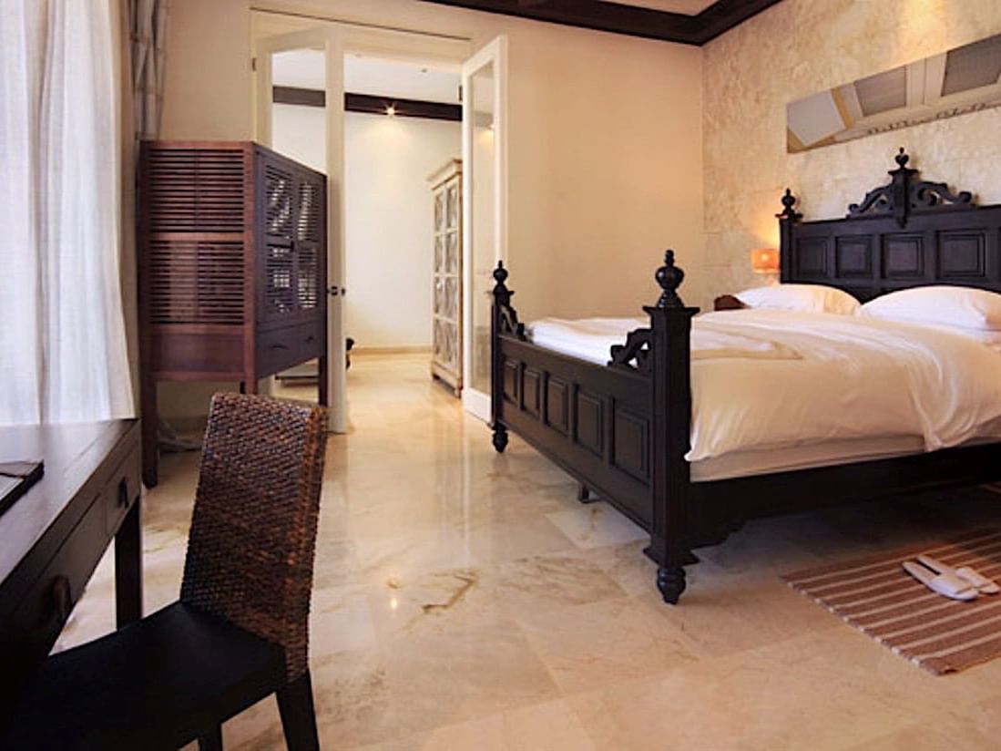 Interior of Deluxe Suites bedroom at Casa Colonial Beach & Spa