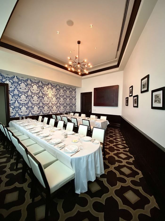 Two dining tables arranged in Private Dining Room at Diplomat Beach Resort