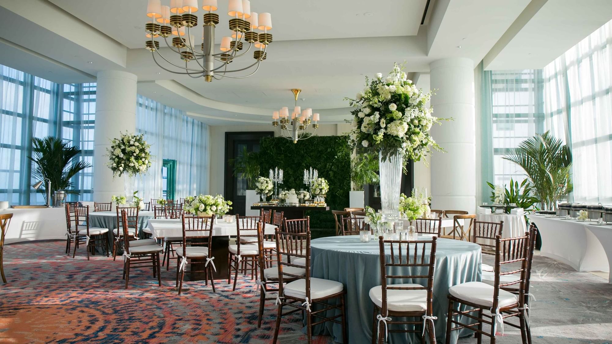 Banquet set-up with floral arrangement for wedding ceremony at Diplomat Beach Resort