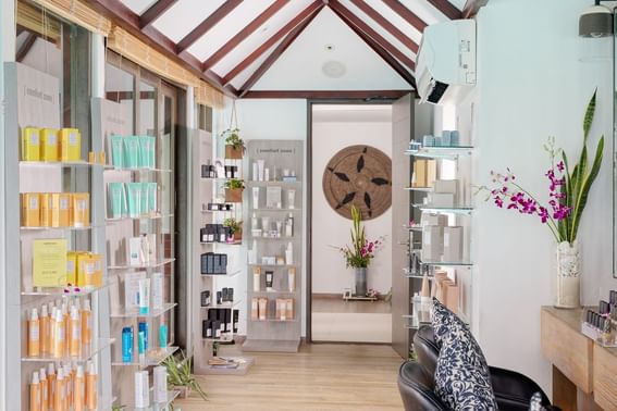 A well-organized salon displaying shelves filled with an array of beauty products at Grand Park Kodhipparu, Maldives