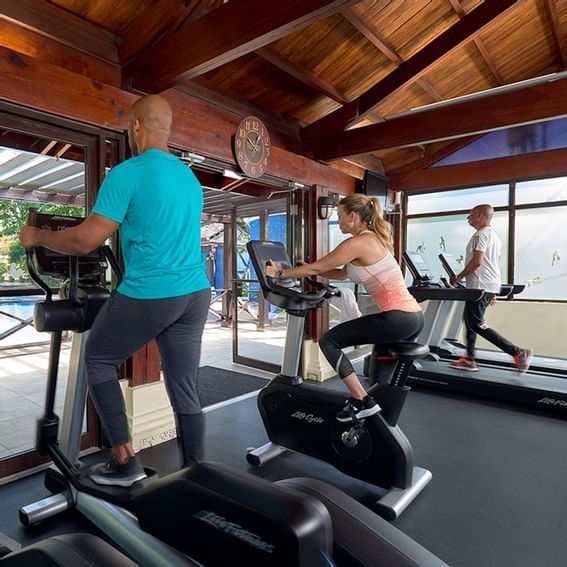 Guests doing cardio in the Gym at Terra Nova Suite Hotel