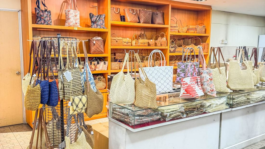 Various handcrafted bags and accessories on display at Jadi Batek.