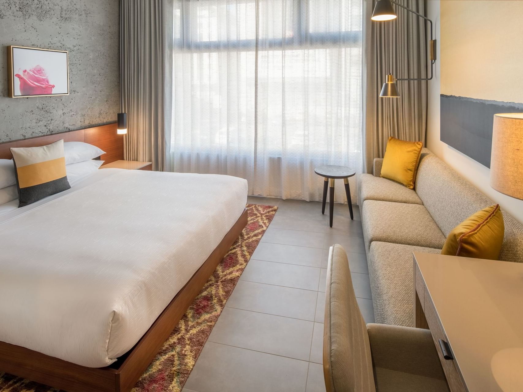 Hi-Lo hotel room with bed and sofa