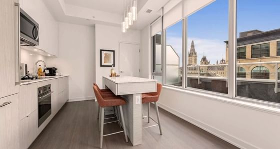 Dining area in the kitchen with a city view at ReStays Ottawa