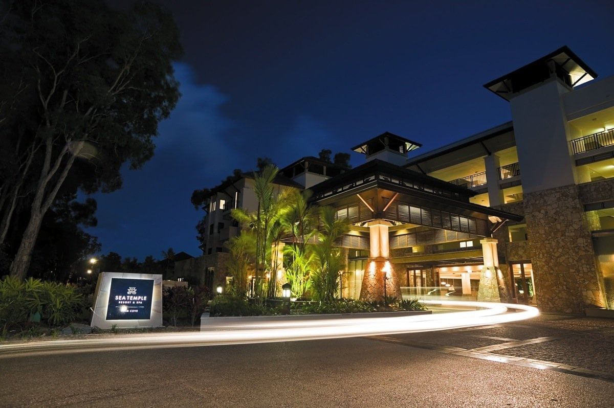 Night exterior view of Pullman Palm Cove Sea Temple Resort