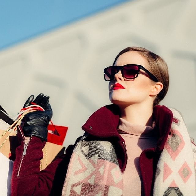 Lady wearing sunglass enjoying shopping near Orsett Hall Hotel