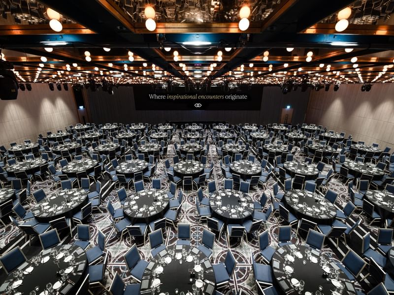 Wentworth ballroom configured for large gala dinner with hundreds of seats and stage lighting