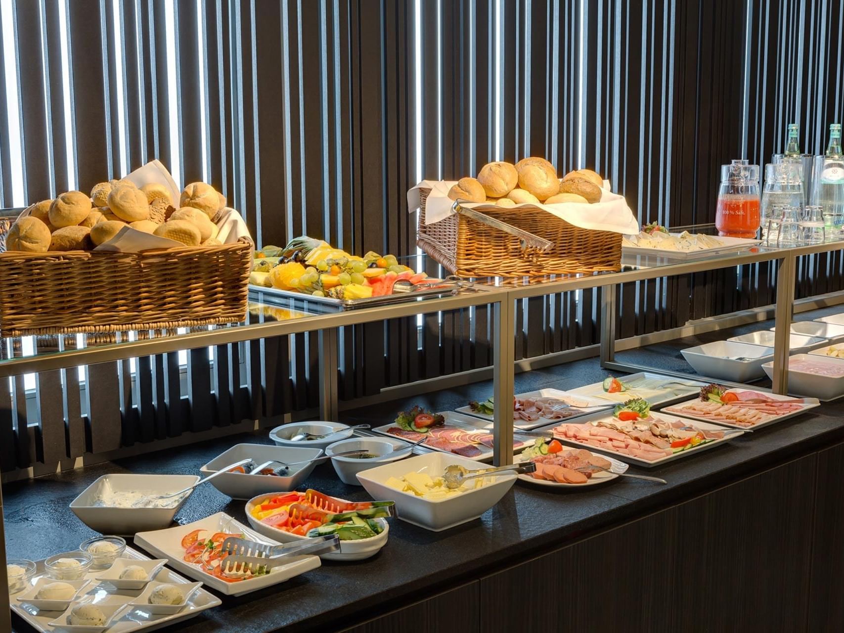 A delicious breakfast spread and a variety of pastries at Hotel Sylter Hof Berlin