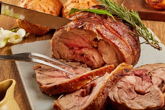 Close-up of slicing a roast lamb dish at The Danna Langkawi