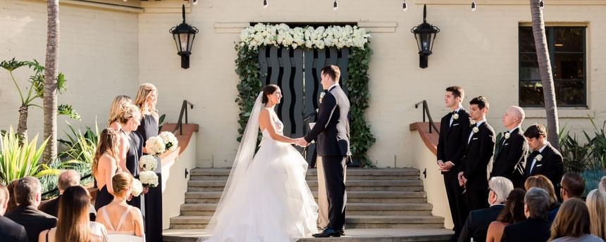 Wedding ceremony arranged outdoors on a sunny day at Catalina Island Company