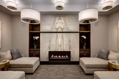 Silver Aspen Spa lobby & lounge with white interior at Stein Eriksen Residences