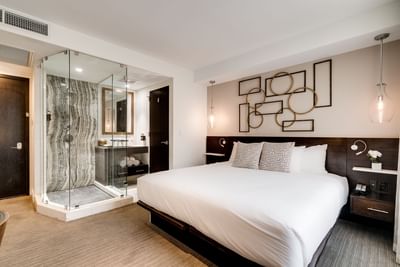 Bed & bathroom in Standard King Room at Berkeley Shore Hotel