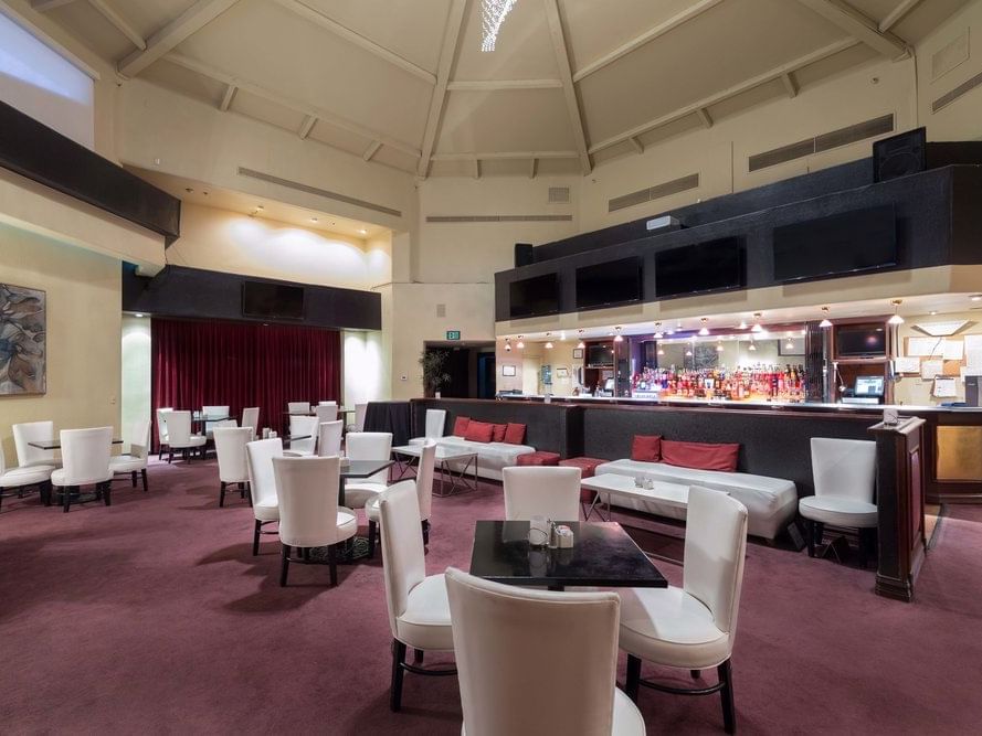Lounge and tables in Pegasus Bar at the Alexis Park Resort