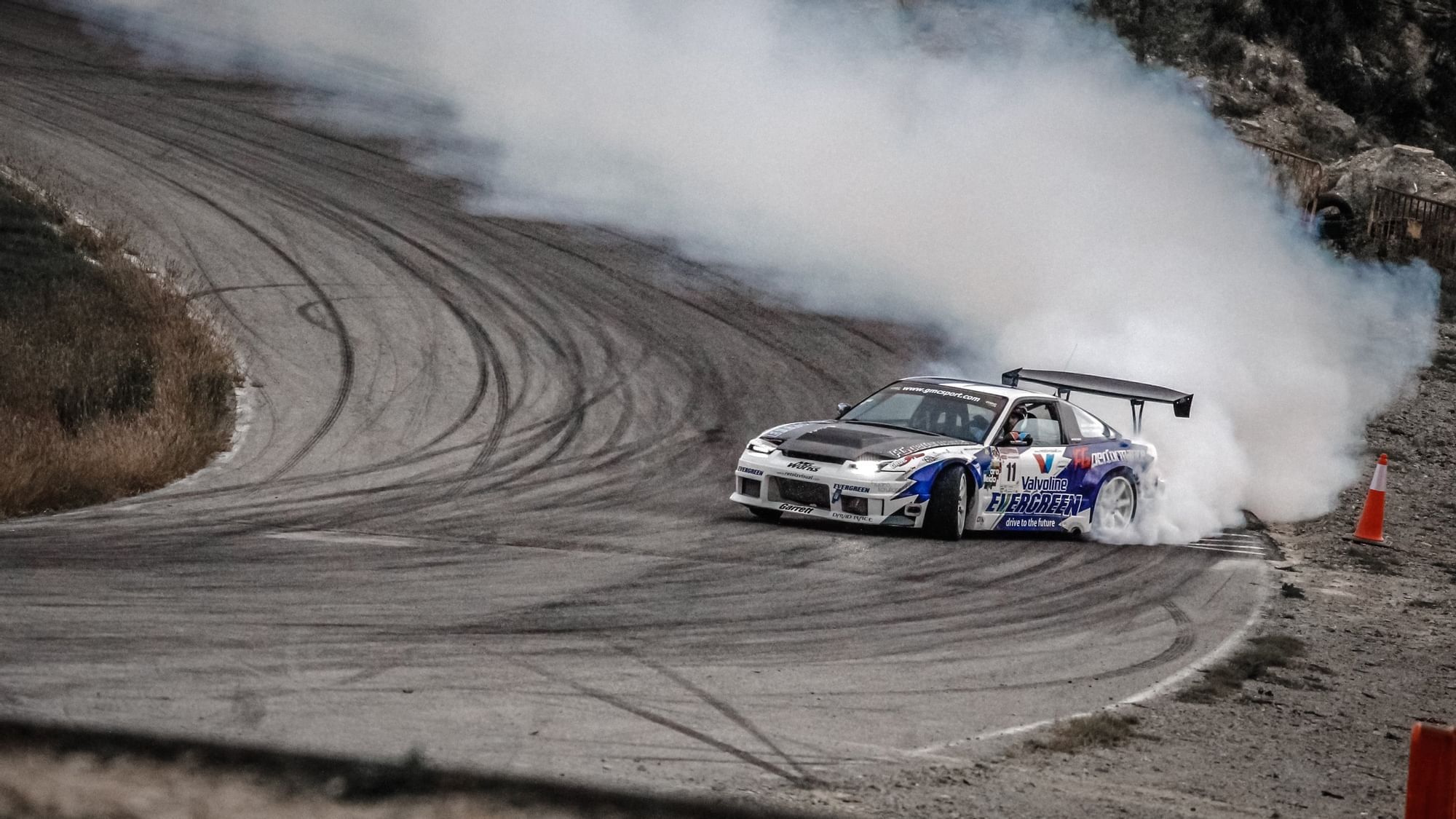 A racing car driving High Speed near The Original Hotels