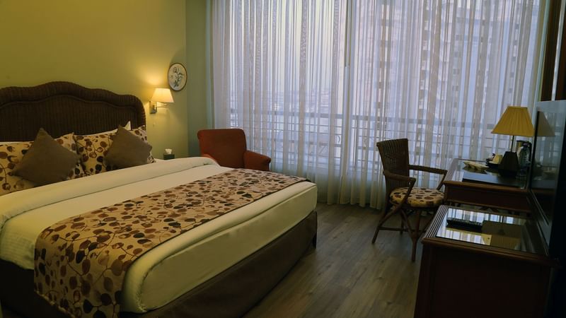 Work desk facing the bed in Classic Room at Warwick Palm Beach Hotel - Beirut