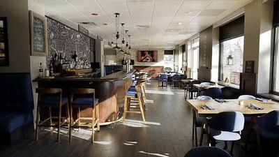 Restaurant dining room at Embassy Hotel & Suites Ottawa