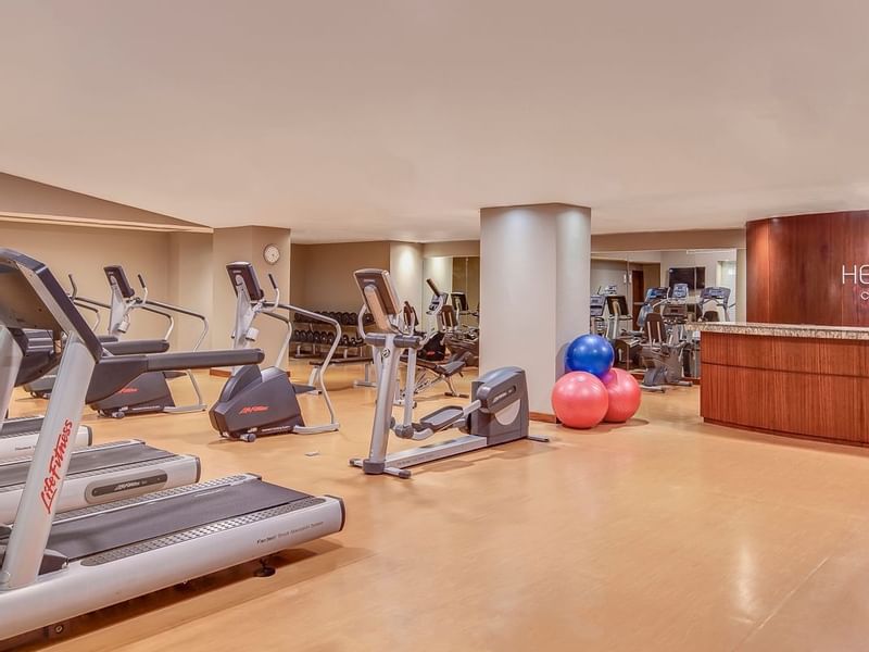 An indoor gym with gym equipment at Fiesta Americana