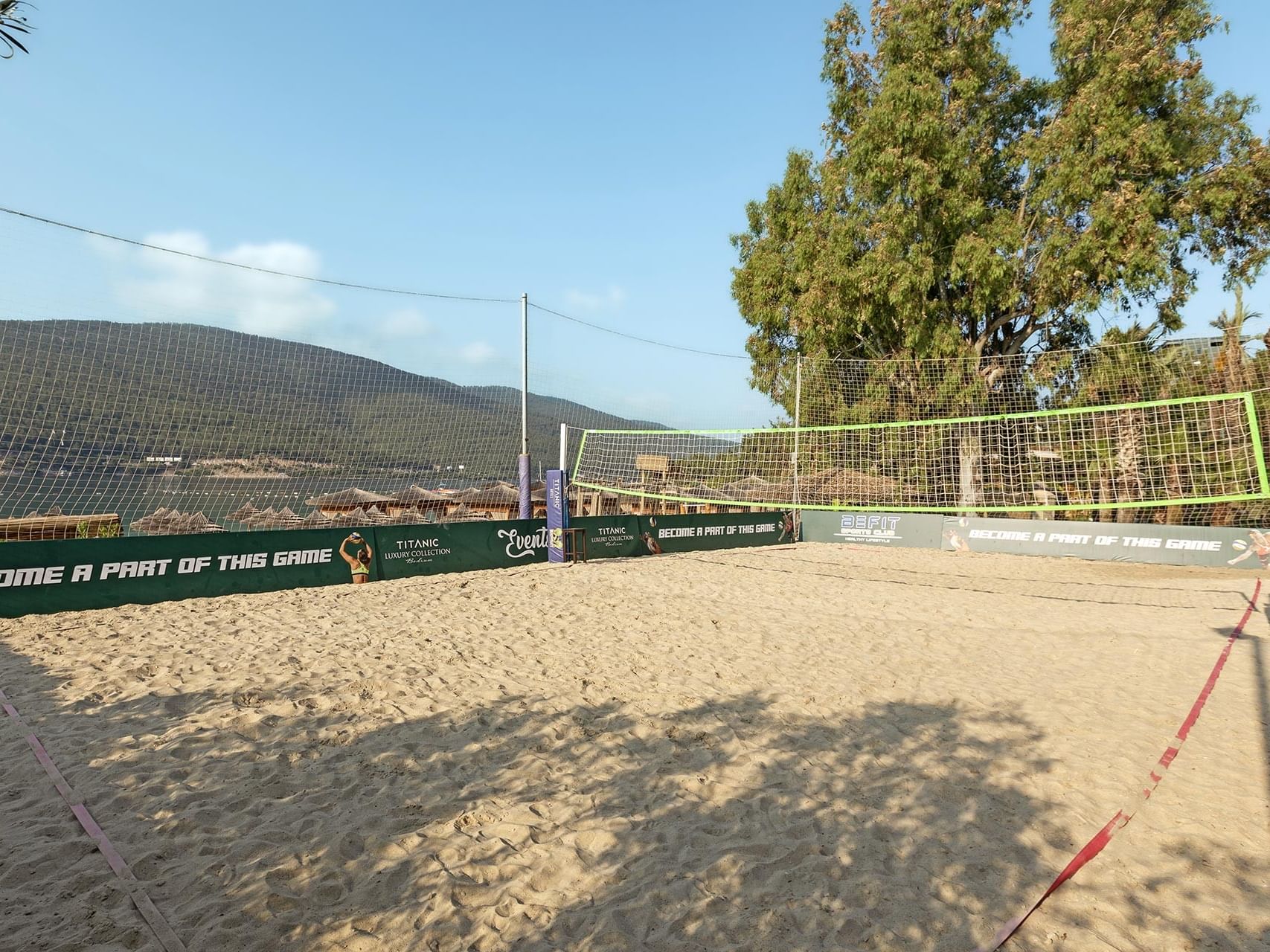 A stylish beach volleyball court on the sand at Titanic Luxury Collection Bodrum.