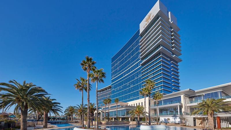 Exterior view of a Crown Hotels façade at night