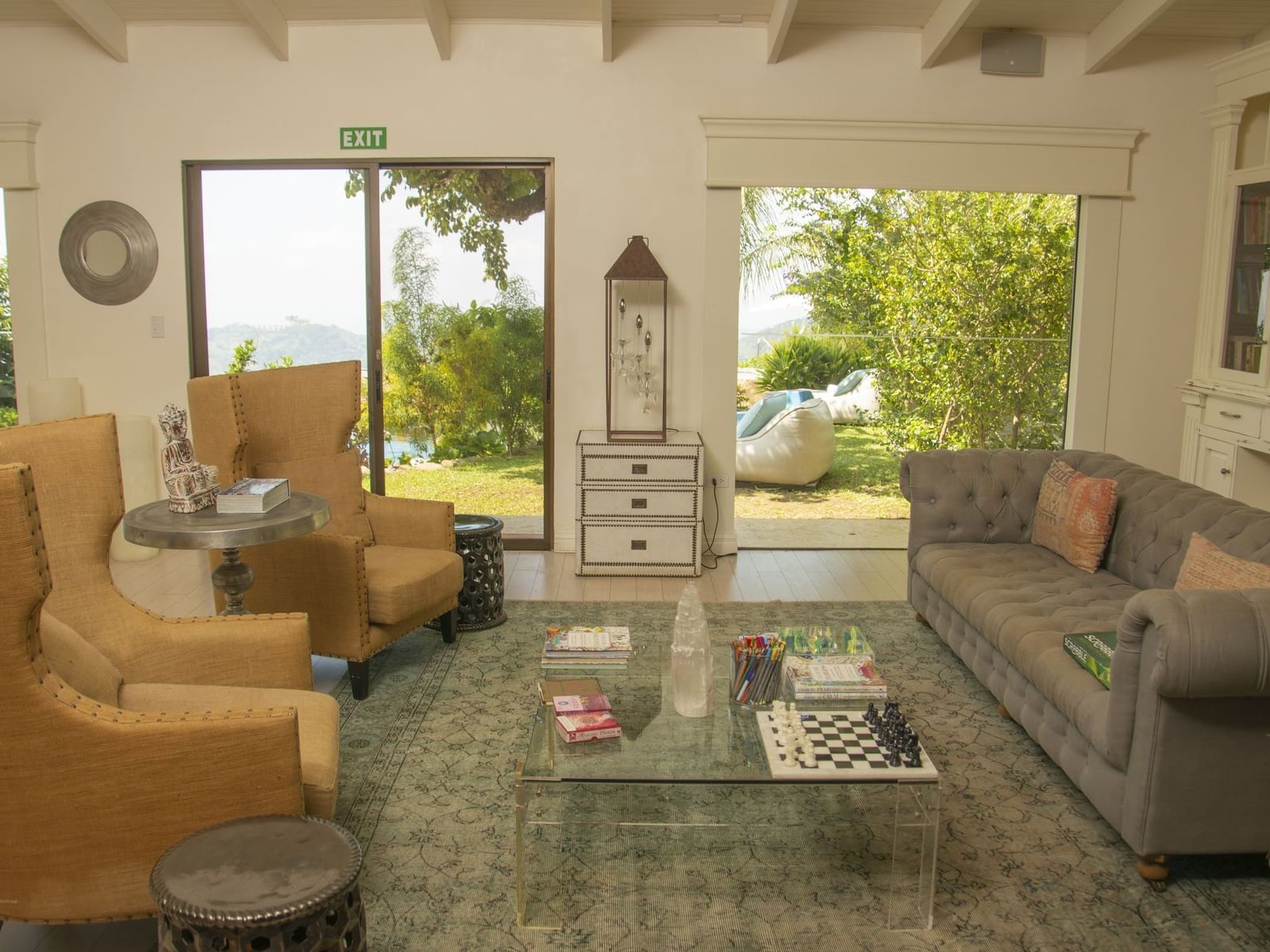 Interior of a reading room with patio at Retreat Costa Rica