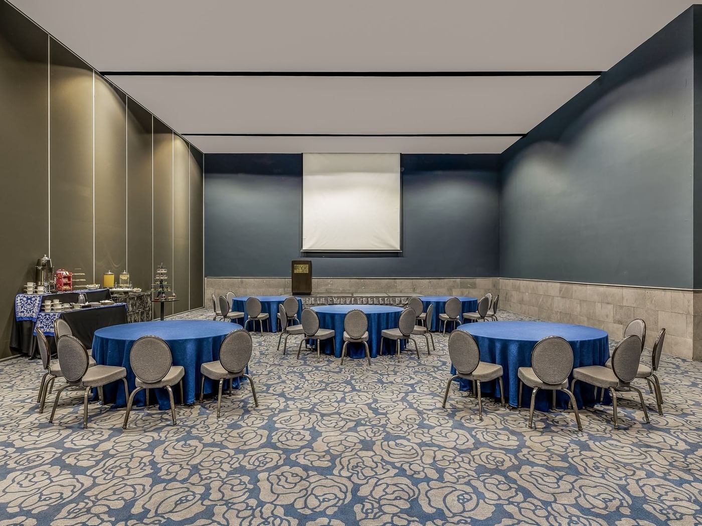 Round tables arranged for a conference in Allende Room at Live Aqua Resorts and Residence Club
