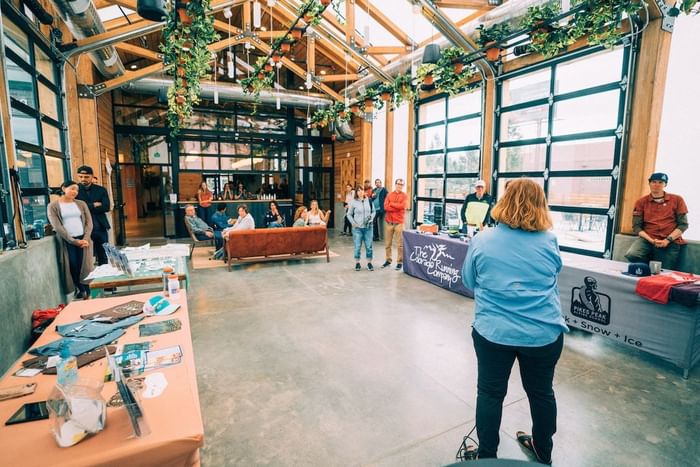 People conferencing in The Greenhaus at Kinship Landing