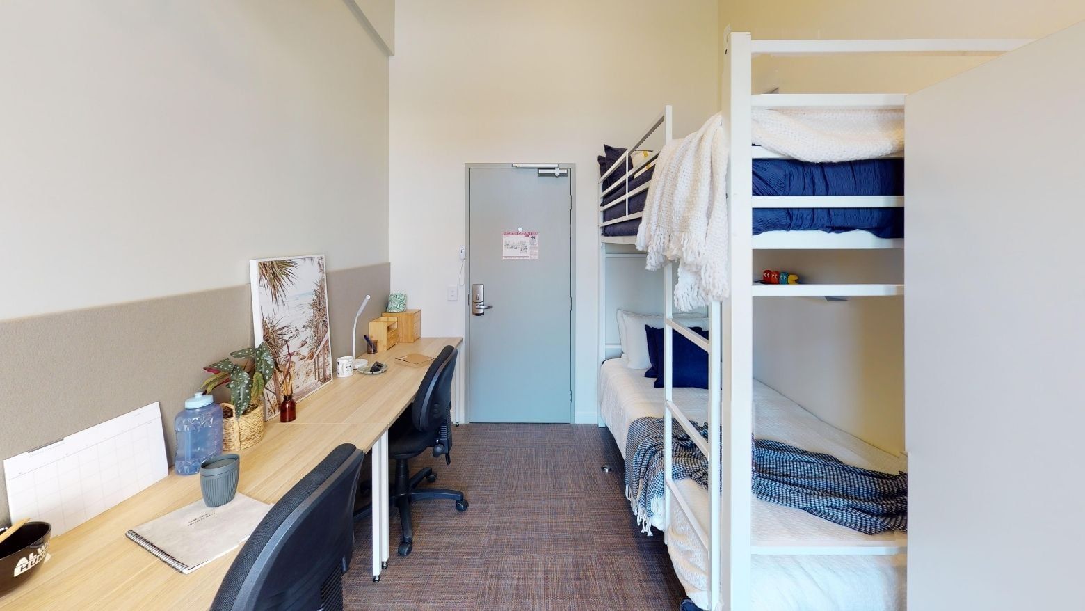 Bunk Room Twin Share with two bunk beds and two desks at UniLodge Herston.