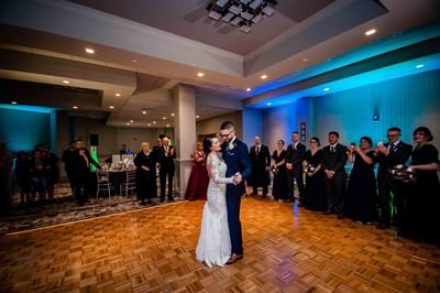 bride and groom dancing
