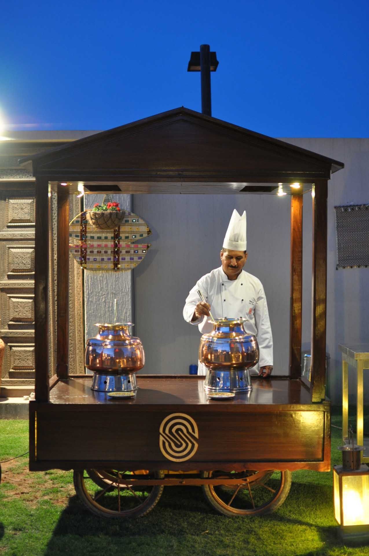 Chef cooking in an open air cart in Islamabad Serena Hotel
